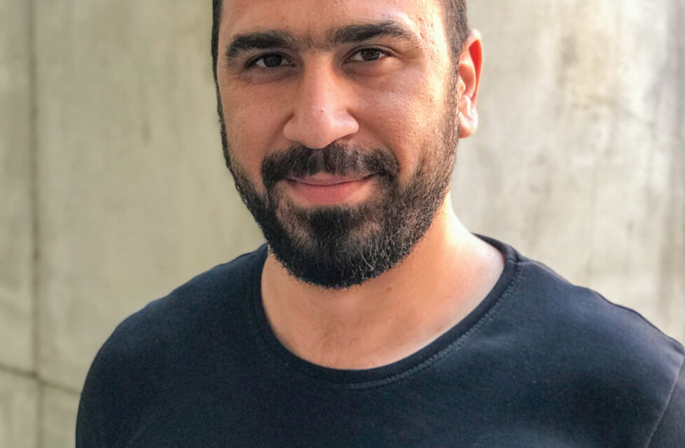 Syrian man smiles